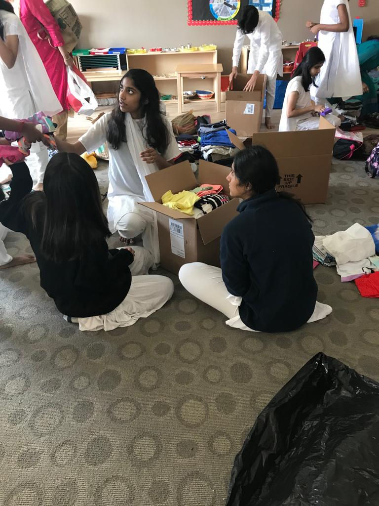 Packing Clothes for Orphans in Ghana, photograph 3