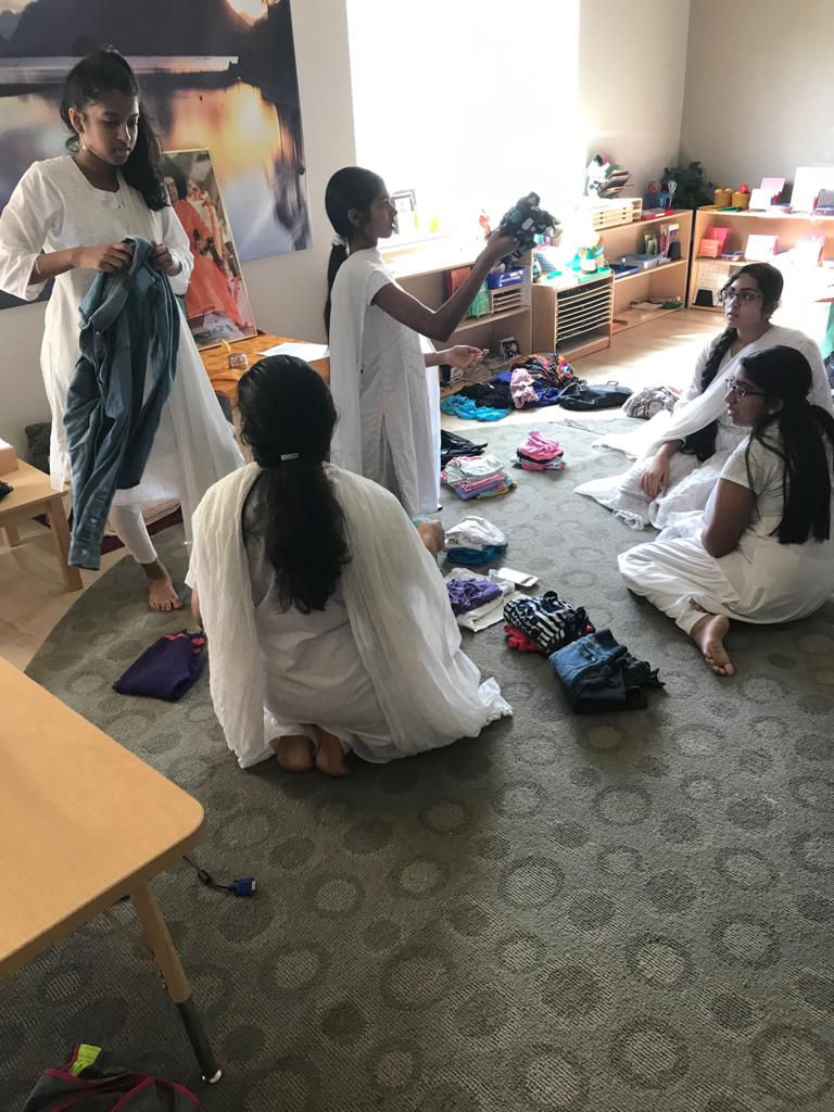 Packing Clothes for Orphans in Ghana, photograph 1