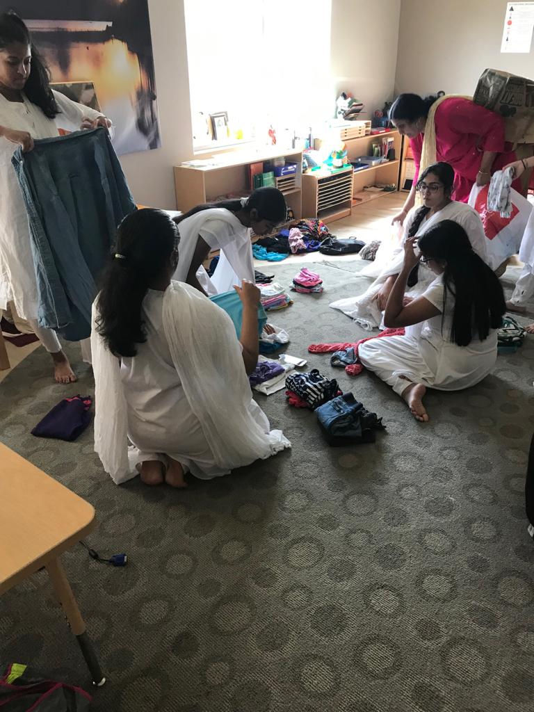 Packing Clothes for Orphans in Ghana, photograph 2