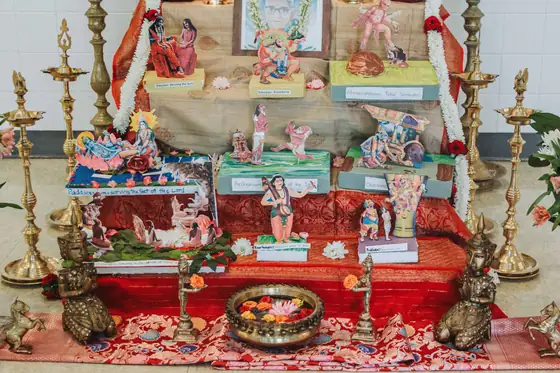 Offerings and lamps arranged before the shrine.