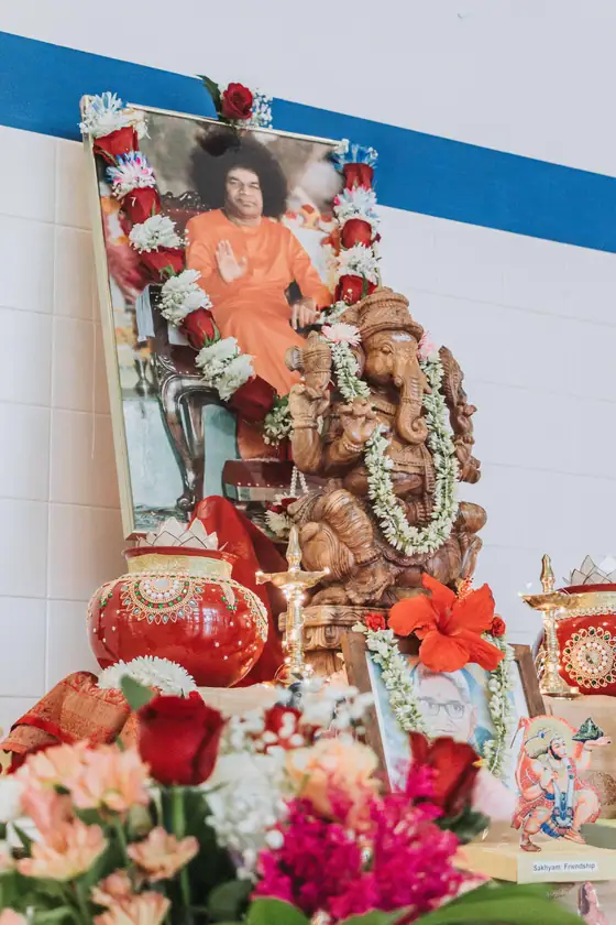 Flowers and lamps at the side shrine.