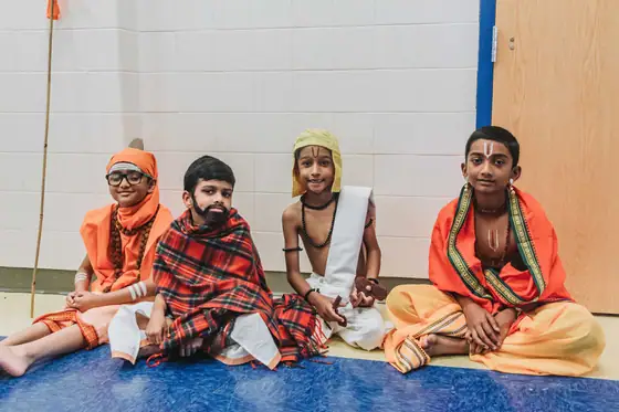 Students in costume, waiting for their segment.