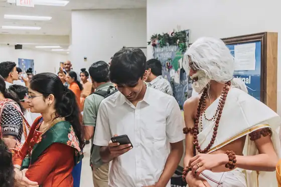 Families and performers gathering in the lobby.