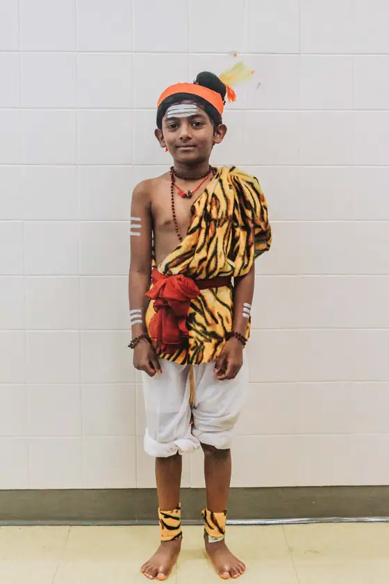 A young performer in costume.
